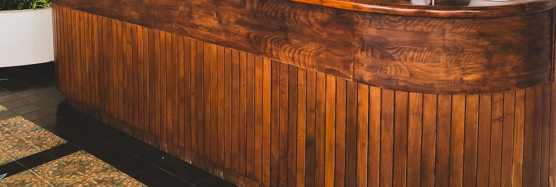 The wooden bar and the encaustic tiled floor